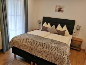 Posteľ alebo postele v izbe v ubytovaní Apartmenthaus WALDHORN