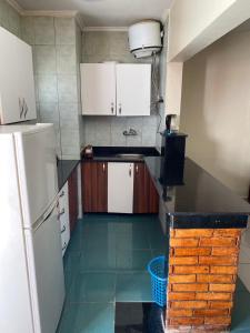 A kitchen or kitchenette at Delta Sharm 205