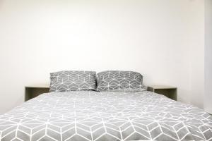 מיטה או מיטות בחדר ב-The Duffryn