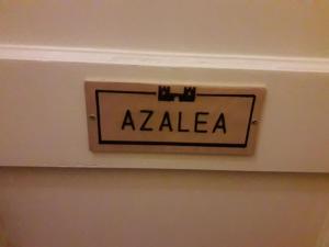 a sign that says azaaza on a wall at Brass Castle Country House Accommodation in Middlesbrough