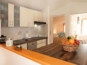 Kuchyň nebo kuchyňský kout v ubytování Apartment Marinella-1 by Interhome