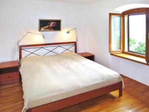 Postel nebo postele na pokoji v ubytování Apartment Lili - RAC139 by Interhome + 10 fotografií