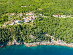 an aerial view of a village on a hillside near the water at Apartment Julka by Interhome in Kraj