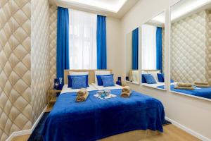 Postel nebo postele na pokoji v ubytování Budapest Holidays Harmony