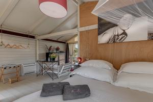 Postel nebo postele na pokoji v ubytování Be Vedetta - Relais & Glamping - Adult Only