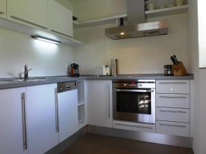 Kuchyň nebo kuchyňský kout v ubytování Apartment Chesa Piz Cotschen 2 by Interhome
