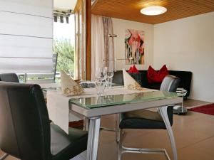 Posezení v ubytování Apartment Chesa Piz Cotschen 2 by Interhome