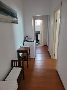 a living room with a couch and a table at Villa Favorita in Eforie Sud