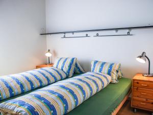 Voodi või voodid majutusasutuse Holiday Home Ar Ronchée N- 9 by Interhome toas