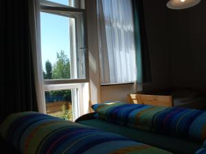 Voodi või voodid majutusasutuse Holiday Home Ar Ronchée N- 9 by Interhome toas