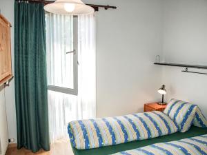 Voodi või voodid majutusasutuse Holiday Home Ar Ronchée N- 9 by Interhome toas