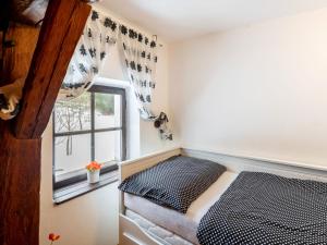 Posteľ alebo postele v izbe v ubytovaní Holiday Home Benešov nad Černou by Interhome