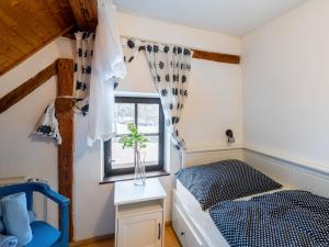 Posteľ alebo postele v izbe v ubytovaní Holiday Home Benešov nad Černou by Interhome