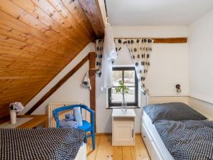 Posteľ alebo postele v izbe v ubytovaní Holiday Home Benešov nad Černou by Interhome
