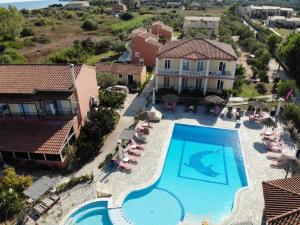 an aerial view of a resort with a swimming pool at Sweet Dreams in Kavos