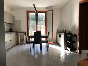 A kitchen or kitchenette at Sweet Maison