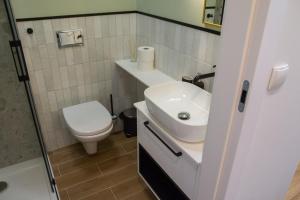 Kúpeľňa v ubytovaní Apartamenty u Kopernika by Rentoom
