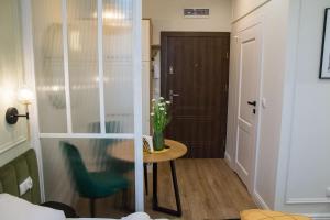 Posteľ alebo postele v izbe v ubytovaní Apartamenty u Kopernika by Rentoom