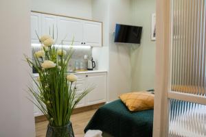 Posteľ alebo postele v izbe v ubytovaní Apartamenty u Kopernika by Rentoom