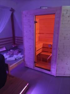 Posteľ alebo postele v izbe v ubytovaní Private Relax Armonia Wellness Apartment