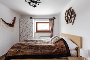 Posteľ alebo postele v izbe v ubytovaní Apartamenty Na Wilcznik Zakopane