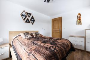 Posteľ alebo postele v izbe v ubytovaní Apartamenty Na Wilcznik Zakopane