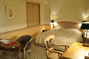 Voodi või voodid majutusasutuse Hotel Bientos toas