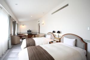 Tempat tidur dalam kamar di Hotel Bientos