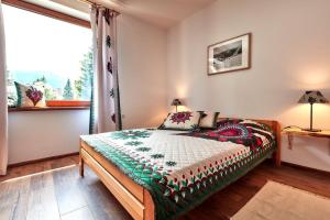 Posteľ alebo postele v izbe v ubytovaní Apartamenty Na Wilcznik Zakopane