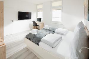Postel nebo postele na pokoji v ubytování Haus Kluin Wohnung 5