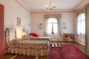 Postel nebo postele na pokoji v ubytování Castello di Roncade