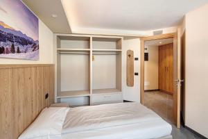Posteľ alebo postele v izbe v ubytovaní Rasia Residence Relax Lake