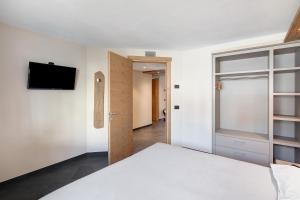 Posteľ alebo postele v izbe v ubytovaní Rasia Residence Relax Lake