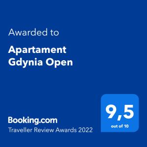 un cartello blu che legge il premio all'appartamento gopolina aperto di Apartament Gdynia Open a Gdynia