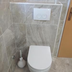 Kúpeľňa v ubytovaní Apartman Mavarcica A4 + 13 fotografií