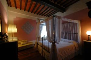 Katil atau katil-katil dalam bilik di Palazzo Bizzarri