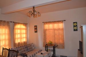 Zona de estar de Golden Shell Residence
