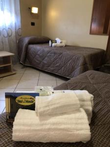Cama o camas de una habitación en Residence Oasi Di Monza