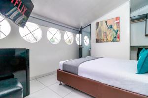 Krevet ili kreveti u jedinici u okviru objekta Hotel Bogota Home