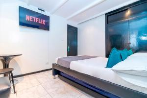 Krevet ili kreveti u jedinici u okviru objekta Hotel Bogota Home