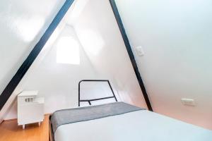 Krevet ili kreveti u jedinici u okviru objekta Hotel Bogota Home