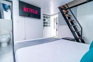 Krevet ili kreveti u jedinici u okviru objekta Hotel Bogota Home