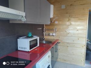 Kuchyň nebo kuchyňský kout v ubytování Habitacion Familiar en un Ático con gran terraza y,cocina ,en la playa