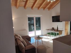Μια τηλεόραση ή/και κέντρο ψυχαγωγίας στο Apartments Pulic