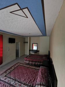 Postel nebo postele na pokoji v ubytování Hotel Antonio + 7 fotografií