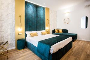 Postel nebo postele na pokoji v ubytování Design Suite Cinque Terre La Spezia