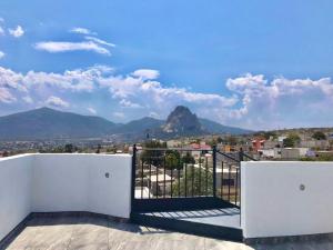 a balcony with a view of a mountain at Hotel Nuevo Bernal in Bernal