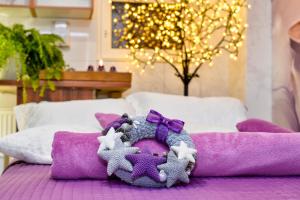 Posteľ alebo postele v izbe v ubytovaní Apartman u vili sa privatnim bazenom i privatnom wellness oazom