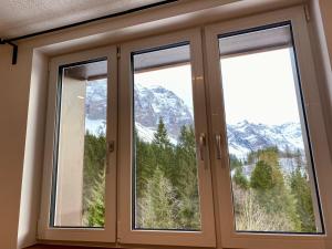 Nespecifikovaný výhled na hory nebo výhled na hory při pohledu z apartmánu