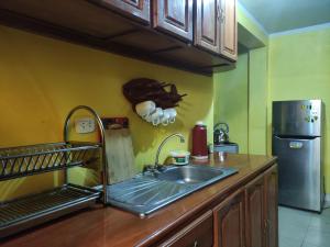 Kuchyň nebo kuchyňský kout v ubytování Casa Sucre Ayacucho